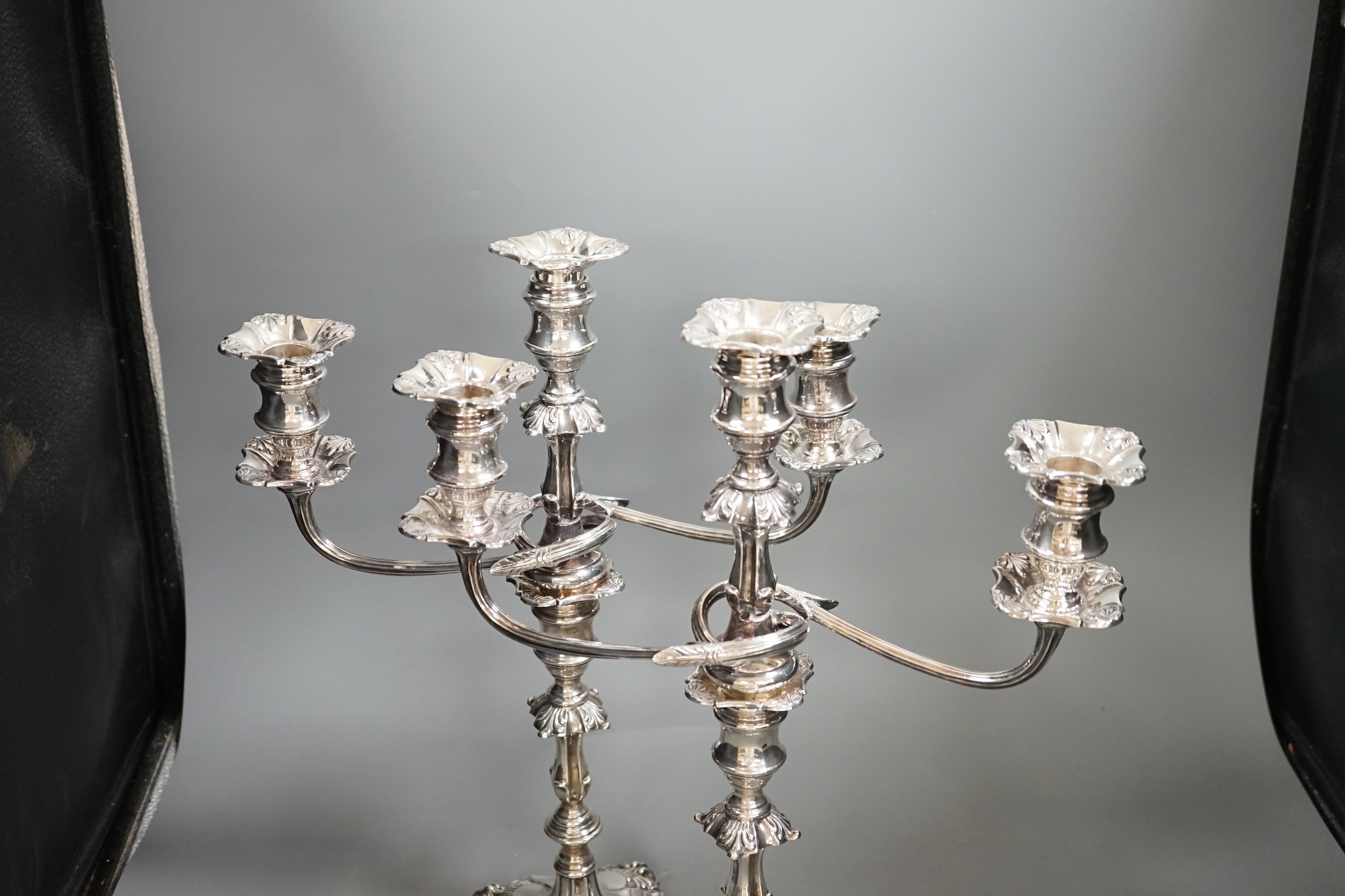 A pair of 1950's silver two branch, three light candelabra, by Atkin Brothers, Sheffield, 1954, height, 40cm, weighted, arms weigh 56oz.